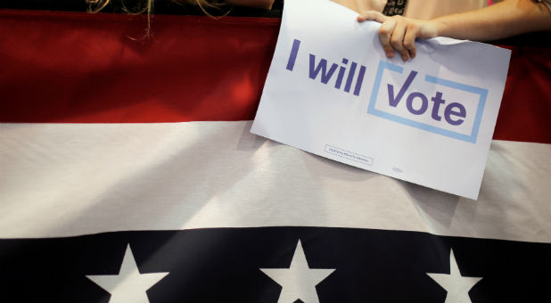 An audience member holds an