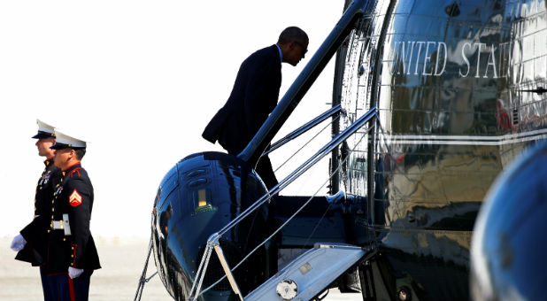 U.S. President Barack Obama boards Marine One to take him to Air Force One to depart Los Angeles and return to Washington