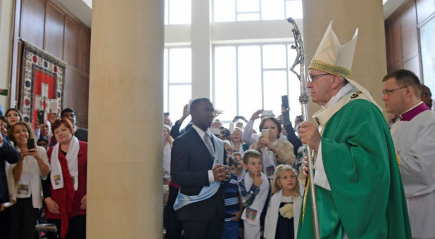 Pope Francis leads a mass at the Immaculate Conception church in Baku, Azerbaijan