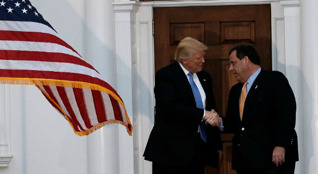 U.S. President-elect Donald Trump shakes hands with New Jersey Governor Chris Christie during his election night rally in Manhattan