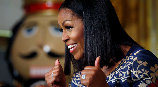 First lady Michelle Obama speaks during an event welcoming military families to the White House to view the holiday decorations