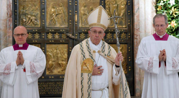 Pope Francis walks after closing the Holy Door to mark the closing of the Catholic Jubilee Year of Mercy at the in Saint Peter's Basilica at the Vatican