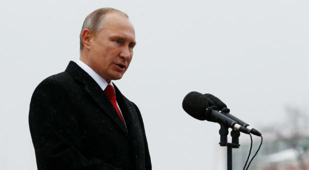 Russian President Putin delivers speech during a ceremony to unveil a monument of grand prince Vladimir I on National Unity Day in Moscow