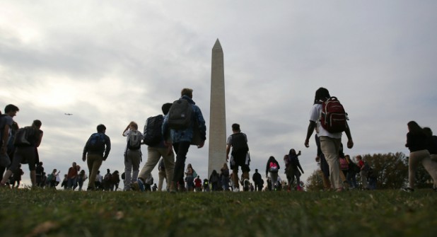 Students attend a protest against President-elect Donald Trump at the National Mall in Washington