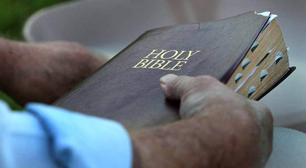 Holding Bible