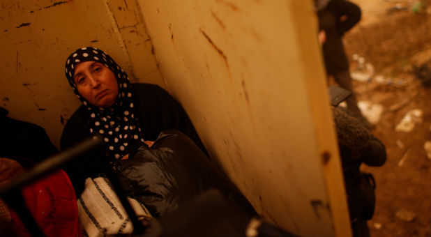 Iraqi woman sits in an army lorry after she flees the Islamic State stronghold of Mosul in al-Samah neighborhood Iraq