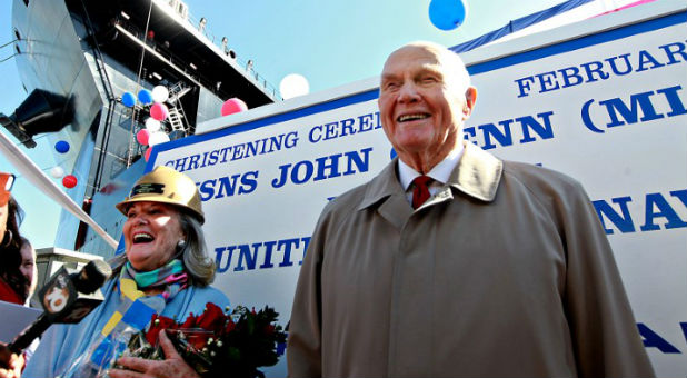 Senator John Glenn speaks with reporters with his daughter Lyn Glenn, during the christening ceremony for the USNS John Glenn at the General Dynamics NASSCO Shipyard in San Diego, California, February 1, 2014.