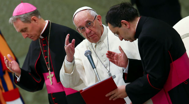 Pope Francis blesses during his general audience in Paul VI Hall at the Vatican