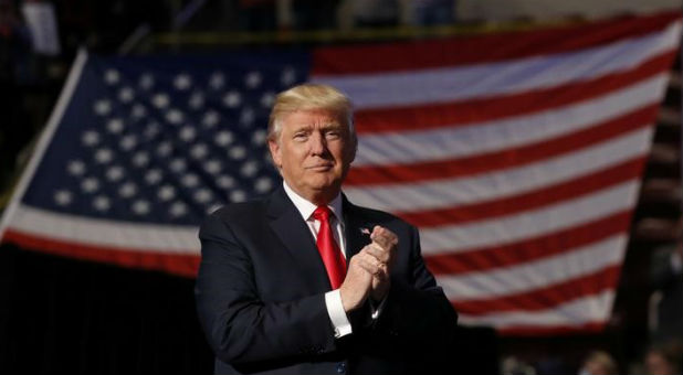 U.S. President-elect Donald Trump arrives to speak during a USA Thank You Tour