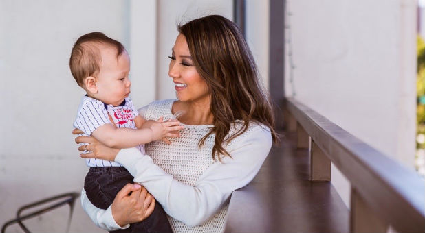 Lisa Smiley with a child.