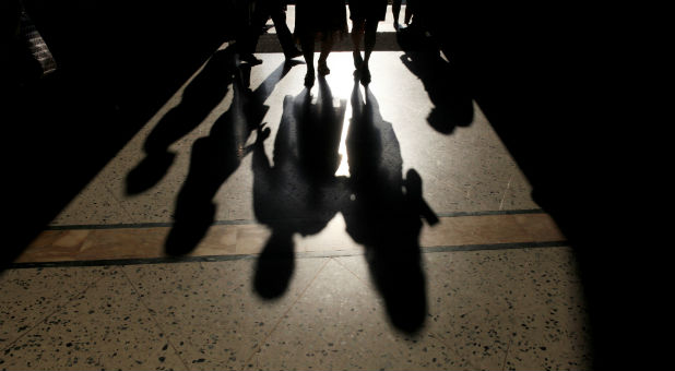 Catholic faithfuls participate in a mass for Ash Wednesday at the Maria Auxiliadora Church in San Salvador, El Salvador