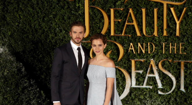 Actors Dan Stevens (L) and Emma Watson