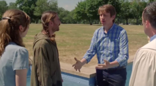 Four characters gather in the baptismal during a recent episode of 'Crashing.'