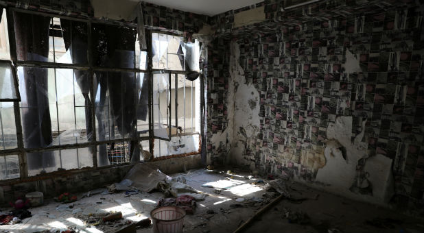 A destroyed room inside an abandoned building is seen in western Mosul, Iraq