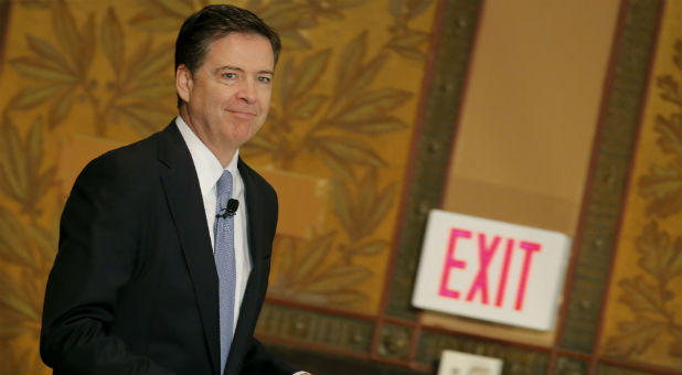 FBI Director James Comey arrives to deliver a speech at the Master of Science in Foreign Service CyberProject's sixth annual conference at Georgetown University in Washington D.C., April 26, 2016.