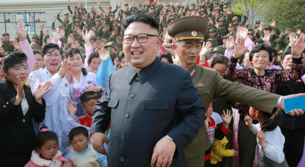 North Korean leader Kim Jong Un inspects the defence detachment on Jangjae Islet and the Hero Defence Detachment on Mu Islet located in the southernmost part of the waters off the southwest front, in this undated photo released by North Korea's Korean Central News Agency