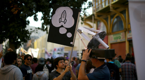 Demonstrators attend the March for Science rally on Earth Day