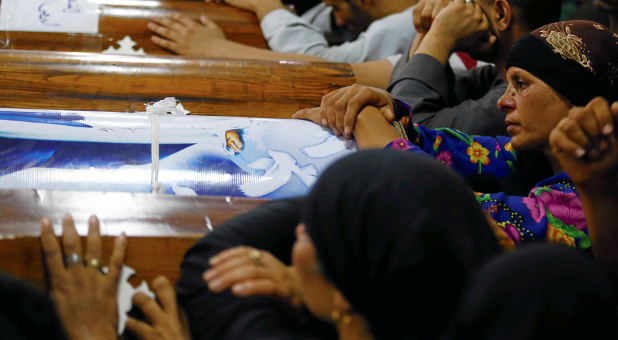 Mourners gather at the Sacred Family Church for the funeral of Coptic Christians who were killed in Minya, Egypt, May 26, 2017.