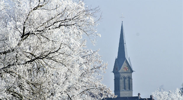 The leadership at Oklahoma's East Central University slammed on the brakes and jettisoned their decision to remove crosses, Bibles and other religious symbols from a historic campus chapel.