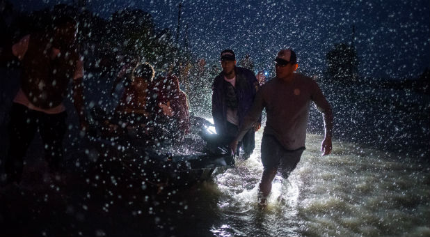 Texas National Guard soldiers assist citizens in heavily flooded areas from the storms of Hurricane Harvey in Houston, Texas, Aug. 27, 2017. Picture taken Aug. 27, 2017.