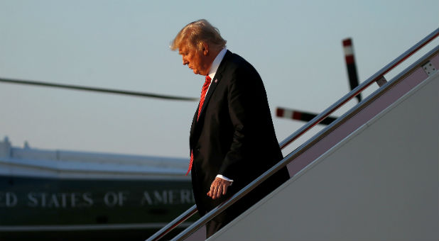 U.S. President Donald Trump walks from Air Force One as he arrives at Joint Base Andrews, Maryland.