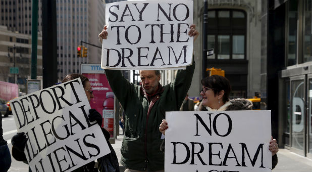 Opponents of the DREAM Act protest.