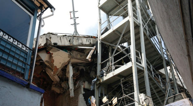 A damaged building is seen after an earthquake hit Mexico City, Mexico.