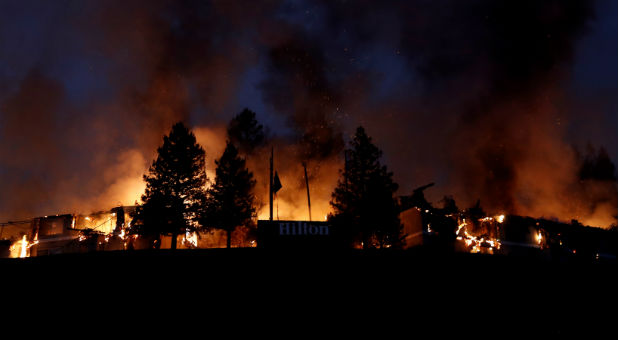 Smoke and flame rise from the Hilton Sonoma Wine Country during the Tubbs Fire in Santa Rosa, California.