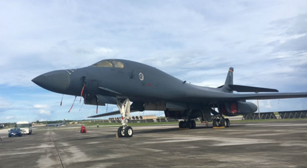 A military plane on an Air Force base.