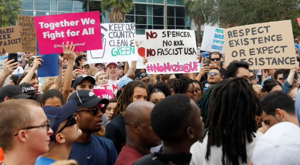 Demonstrators rally before the speech by Richard Spencer, an avowed white nationalist and spokesperson for the so-called alt-right movement.