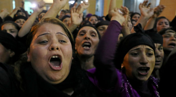 Coptic Christians react after a deadly attack.