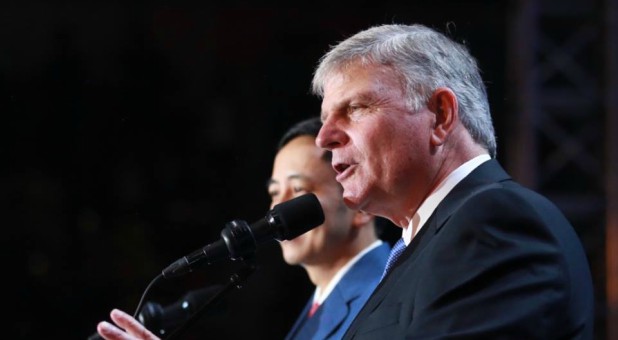 Franklin Graham speaks at a crusade.