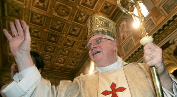 Cardinal Bernard Law, the former Archbishop of Boston who resigned in disgrace after covering up years of sexual abuse of children by priests and whose name became a byword for scandal in the Catholic Church, died on Wednesday.