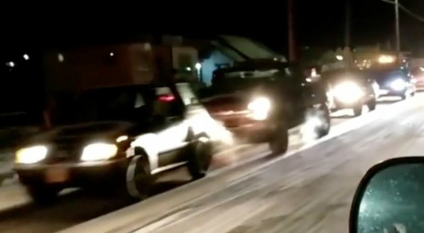 Vehicles are seen during a tsunami warning evacuation in Kodiak, Alaska.