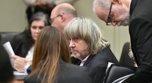 David Turpin (2nd R) and Louise Turpin (L) appear in court for their arraignment in Riverside, California.