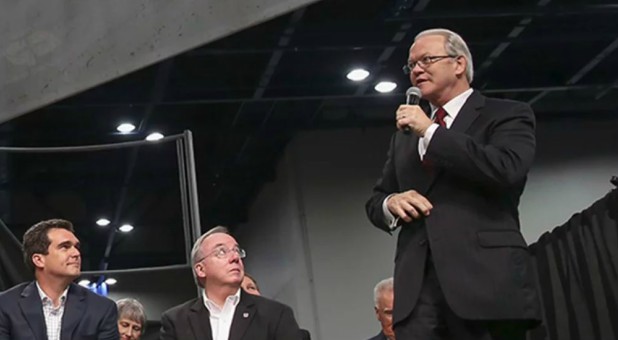 The Rev. Frank Page, right, president of the Southern Baptist Convention Executive Committee, leads a panel discussion at the Southern Baptists' annual meeting in Houston, on June 10, 2013.