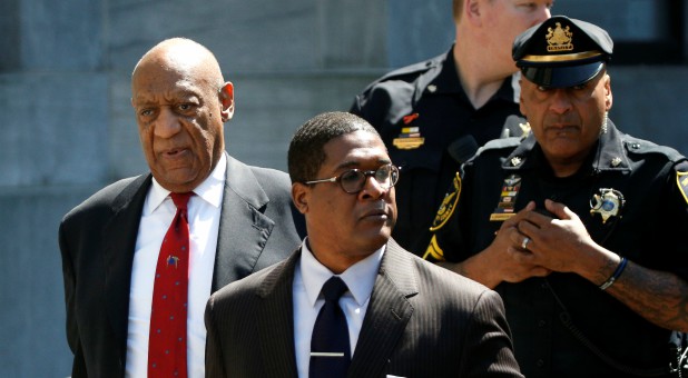 Actor and comedian Bill Cosby exits Montgomery County Courthouse after a jury convicted him in a sexual assault retrial in Norristown, Pennsylvania.