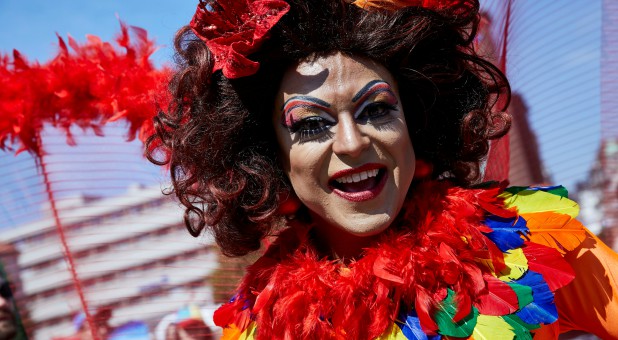 People take part in a march celebrating gay pride.