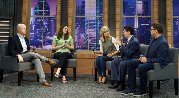 Jonathan Howe, from left, and Amy Whitfield moderate a panel discussion with Beth Moore, Russell Moore and Matt Carter.