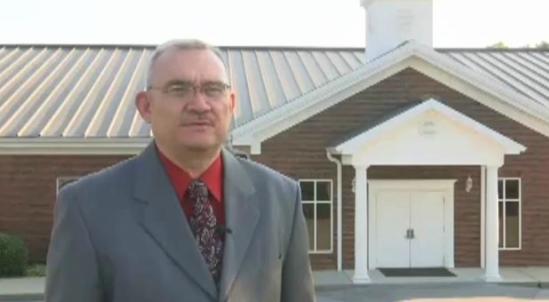 David Berry speaks in front of Welcome Baptist Church.