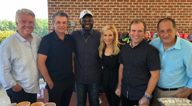 Jack Graham, Jentezen Franklin, Harry Jackson, Paula White and Todd Lamphere visit migrant children.