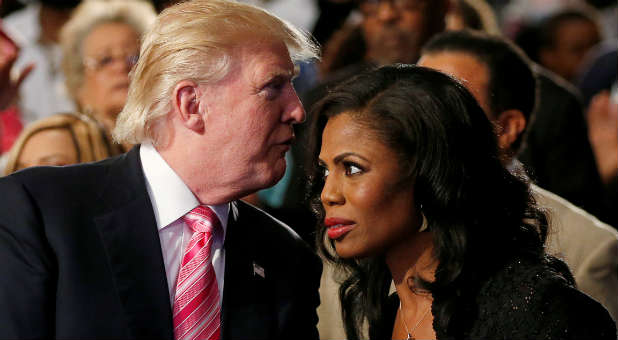 Republican presidential nominee Donald Trump and Omarosa Manigault attend a church service, in Detroit, Michigan, U.S., Sept. 3, 2016.