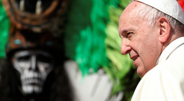 Pope Francis arrives to pose for pictures with participants of the Mexico state of Quintana Roo.