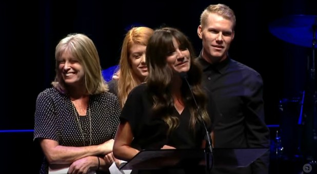 Kayla Stoecklein, front, shares at Andrew's memorial service.