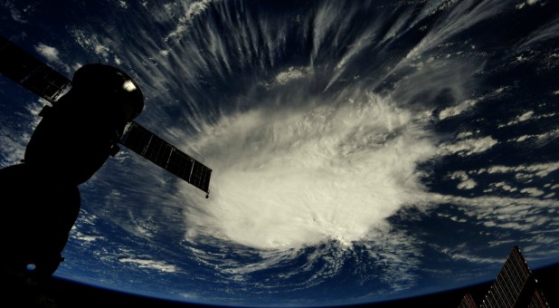 A photo taken from the International Space Station by astronaut Ricky Arnold shows Hurricane Florence over the Atlantic Ocean in the early morning hours of Sept. 6, 2018.