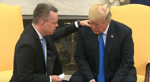 Andrew Brunson prays for Donald Trump.