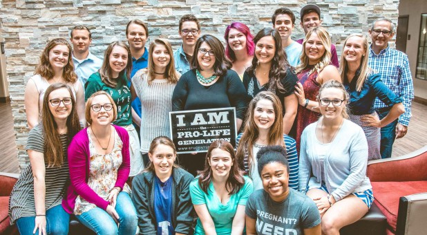 Kristan Hawkins, center, surrounded by members of Students for Life.