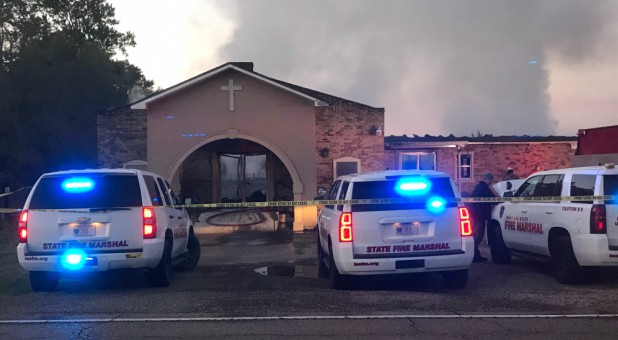 Louisiana State Fire Marshall vehicles are seen outside the Greater Union Baptist Church during a fire, in Opelousas, Louisiana.