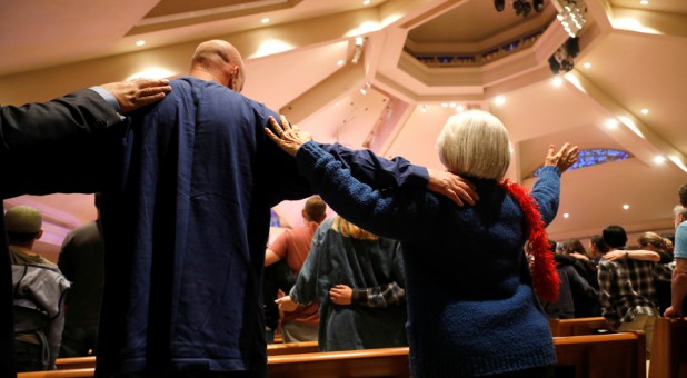 A candlelight vigil is held at Rancho Bernardo Community Presbyterian Church for victims of a shooting incident at the Congregation Chabad synagogue in Poway, north of San Diego, California.