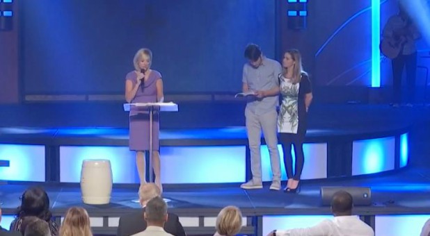 Paula White Cain with Brad and Rachel Knight.